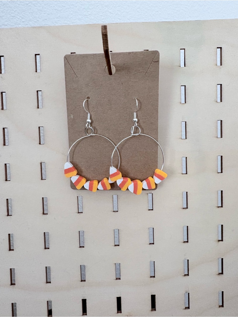 Handcrafted candy corn poly clay beaded hoop earrings